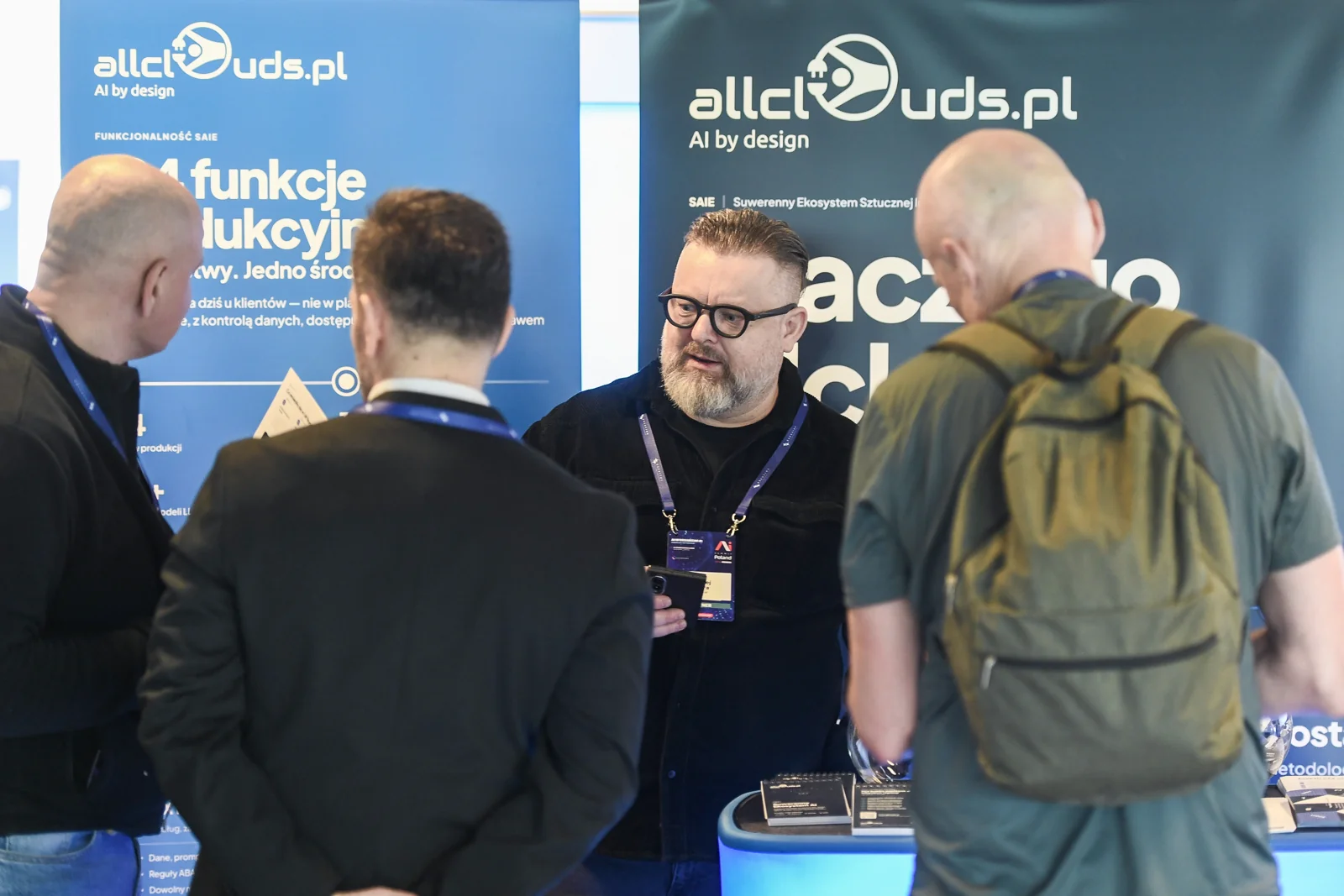 Conference participants at the allclouds.pl stand